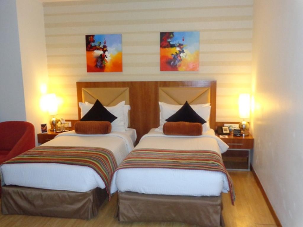Ramada Ahmedabad Quarto foto
